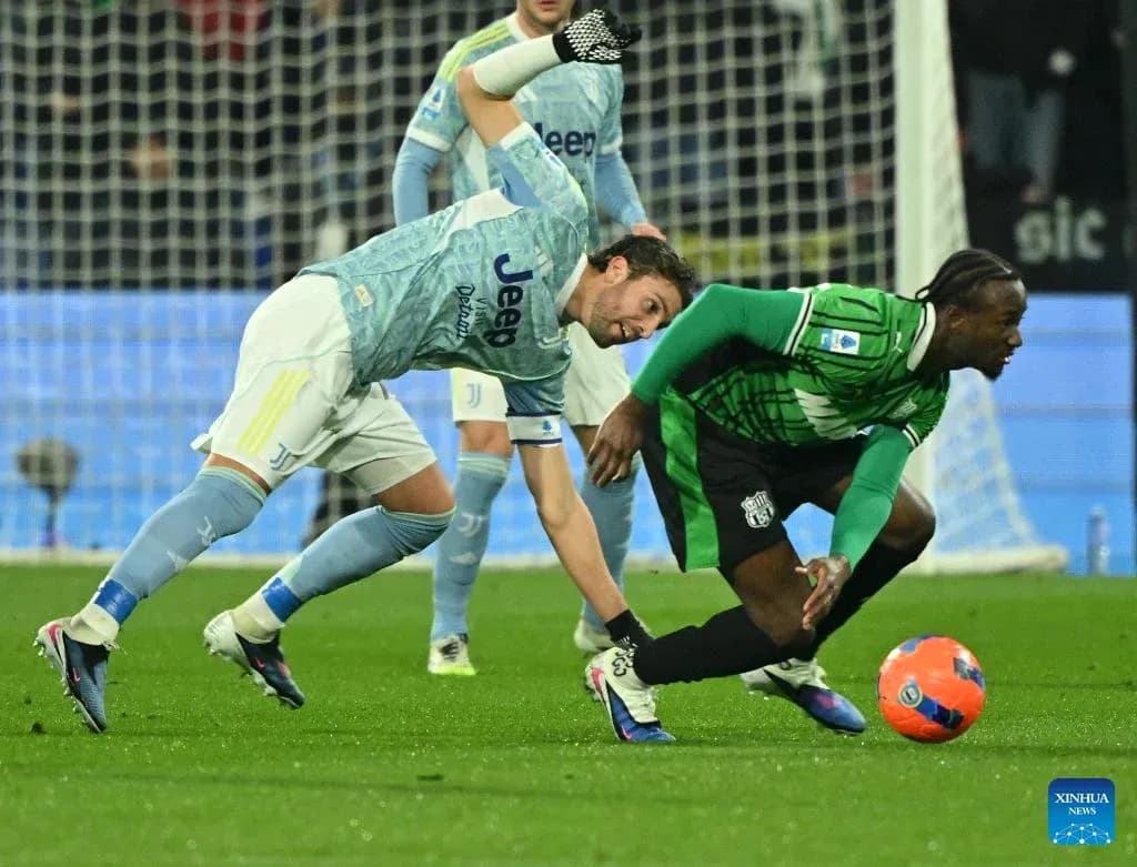 Player tackling for the ball in Serie A match