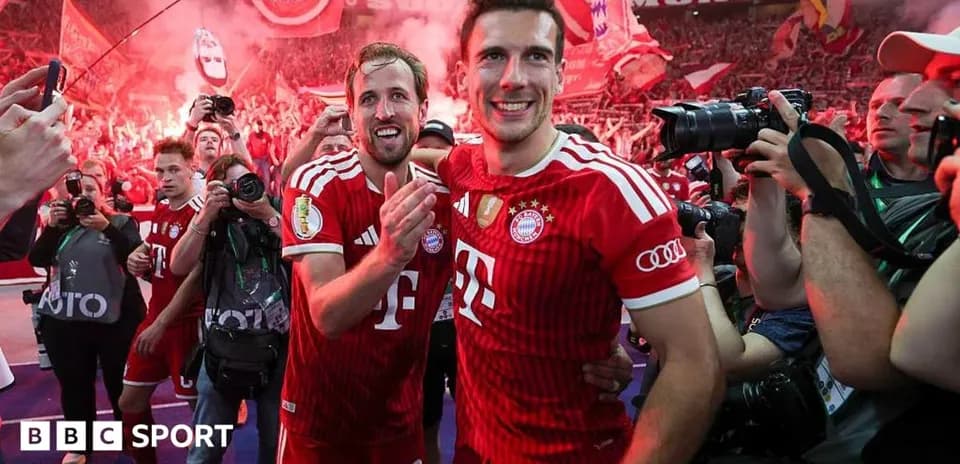 Bayern Munich players celebrating with fans after victory