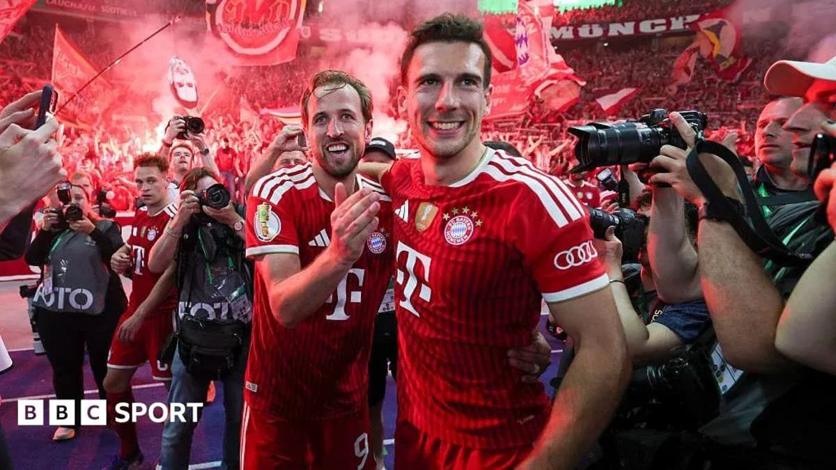 Bayern Munich players celebrating with fans after victory