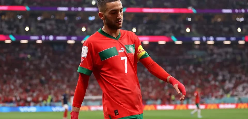 Player wearing red Morocco jersey during match