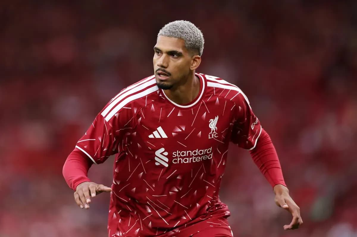 Player wearing Liverpool jersey during match warm-up