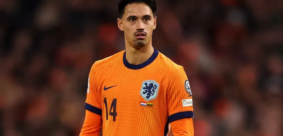 Player in orange Netherlands jersey on the field