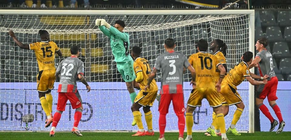 Goalkeeper making a save during Serie A match