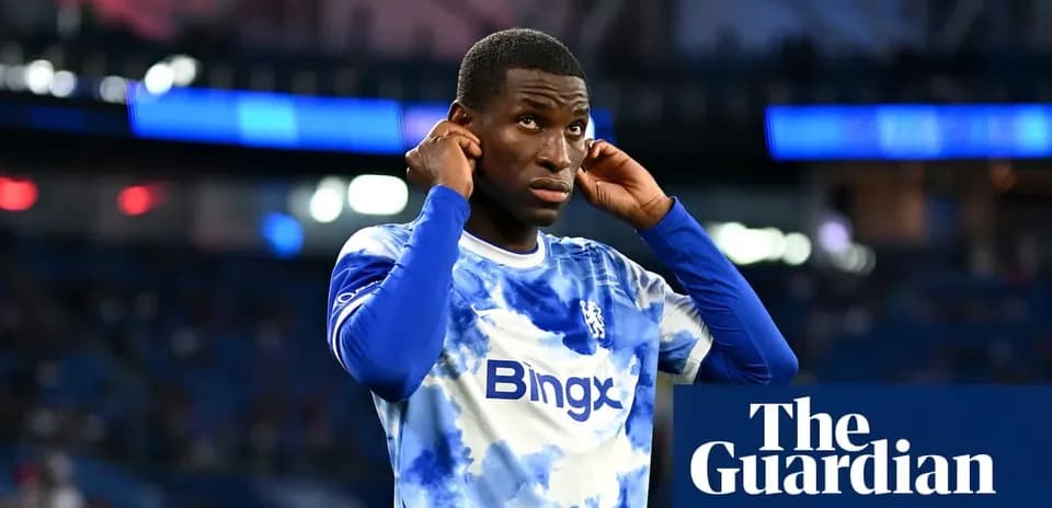 Player adjusting earphones before match on field