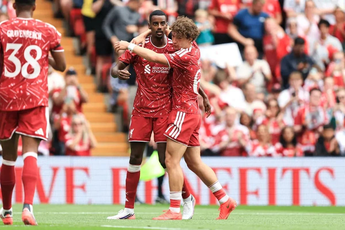 Liverpool players celebrating during a match
