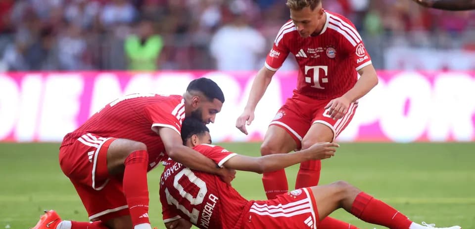 Bayern Munich players celebrating after scoring a goal