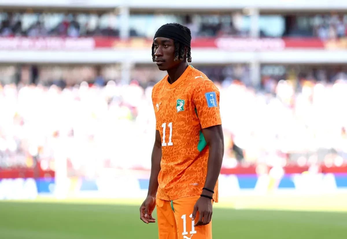 Player in orange jersey during a match