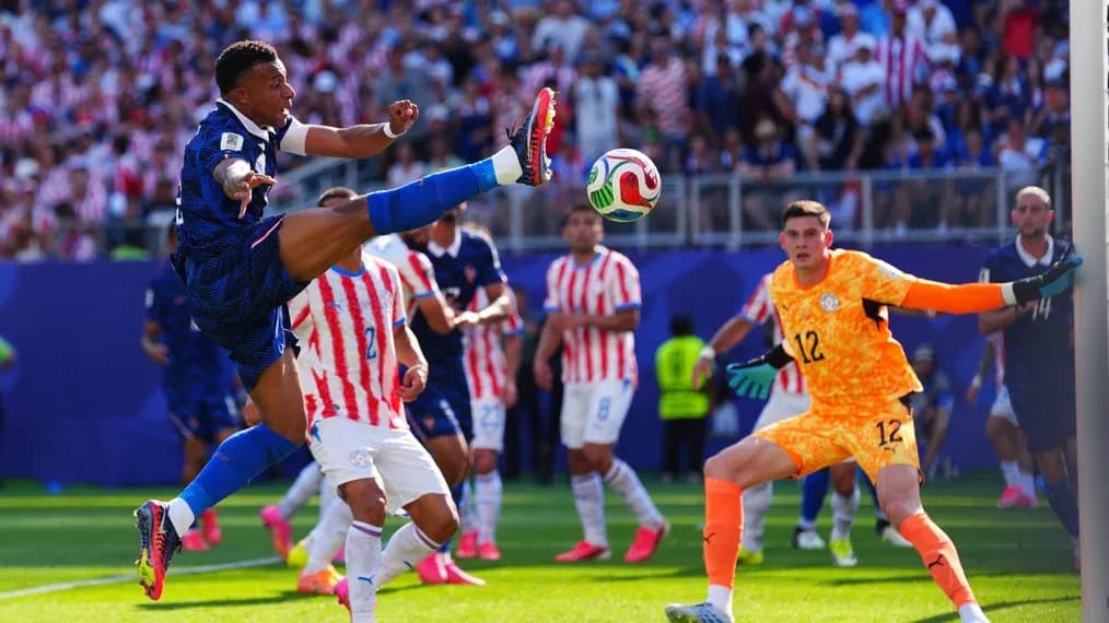 Player executing a kick during a football match