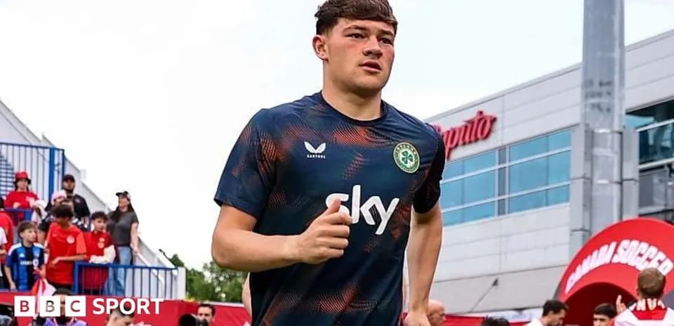 Player jogging onto the field before the match