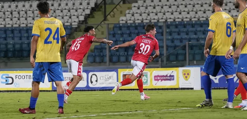 Players celebrating a goal during FK Crvena Zvezda match