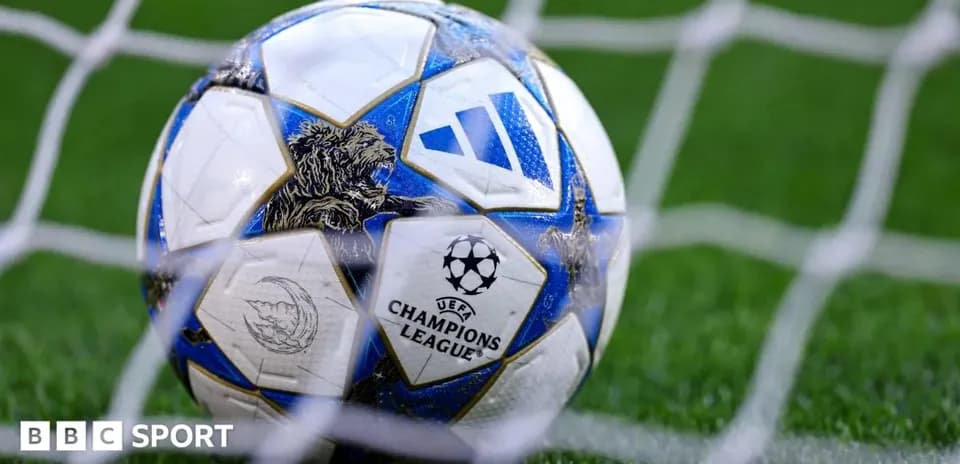 Close-up of UEFA Champions League football in net
