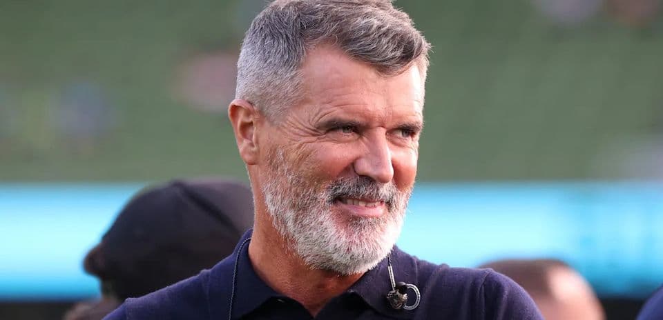 Man with gray hair smiling at event