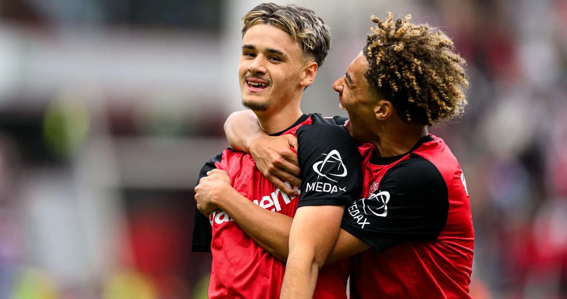 Bayer Leverkusen players celebrating a goal