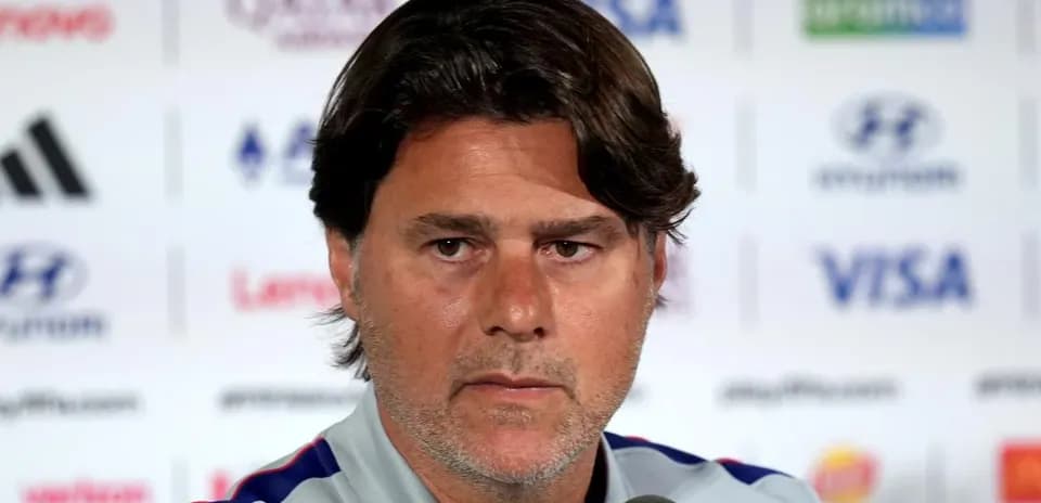 Manager at press conference speaking to media