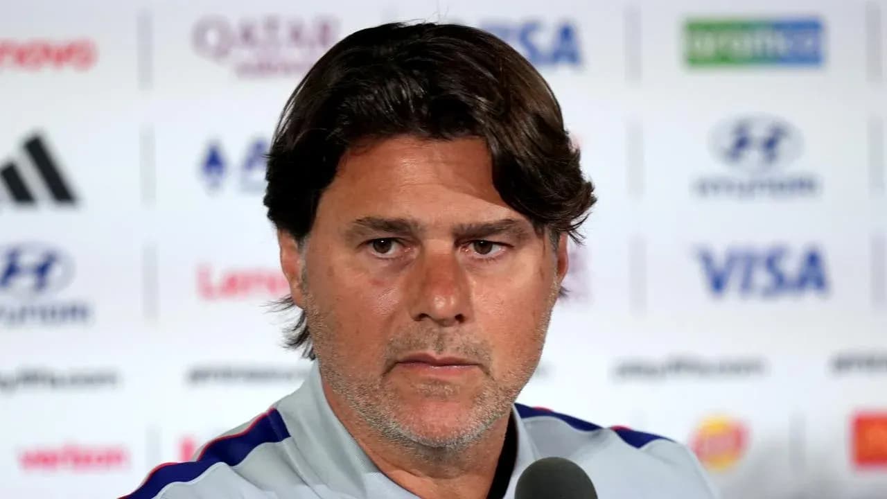 Manager at press conference speaking to media