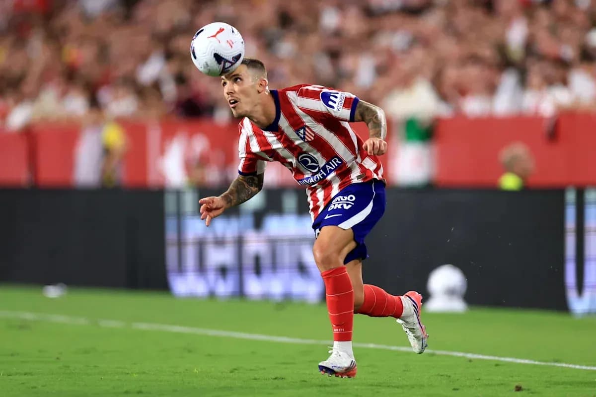Player heading the ball during a match
