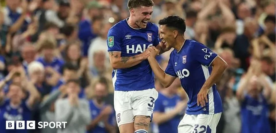 Two players celebrating a goal for Ipswich Town
