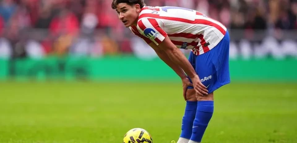 Player preparing for a free kick on the field