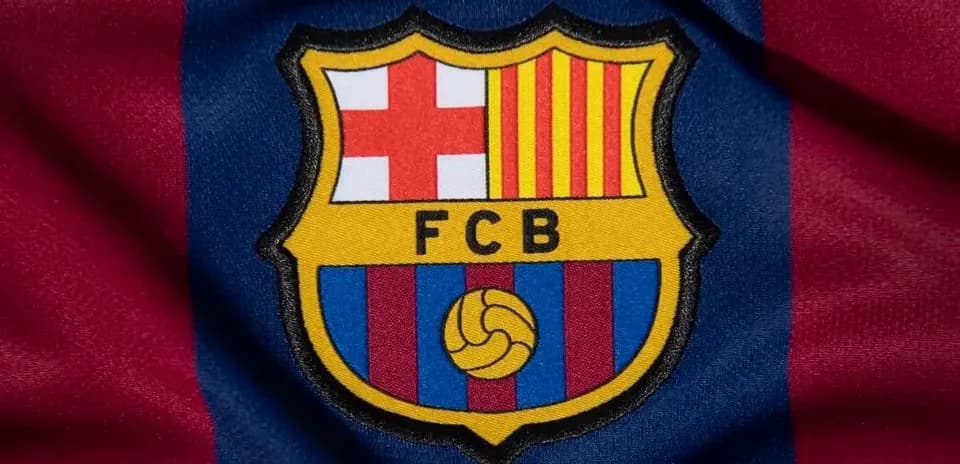 FC Barcelona logo on red and blue background