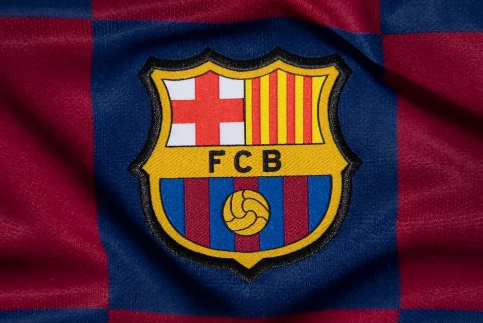 FC Barcelona logo on red and blue background