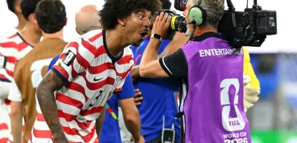 US player celebrating and speaking into camera