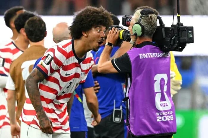 US player celebrating and speaking into camera