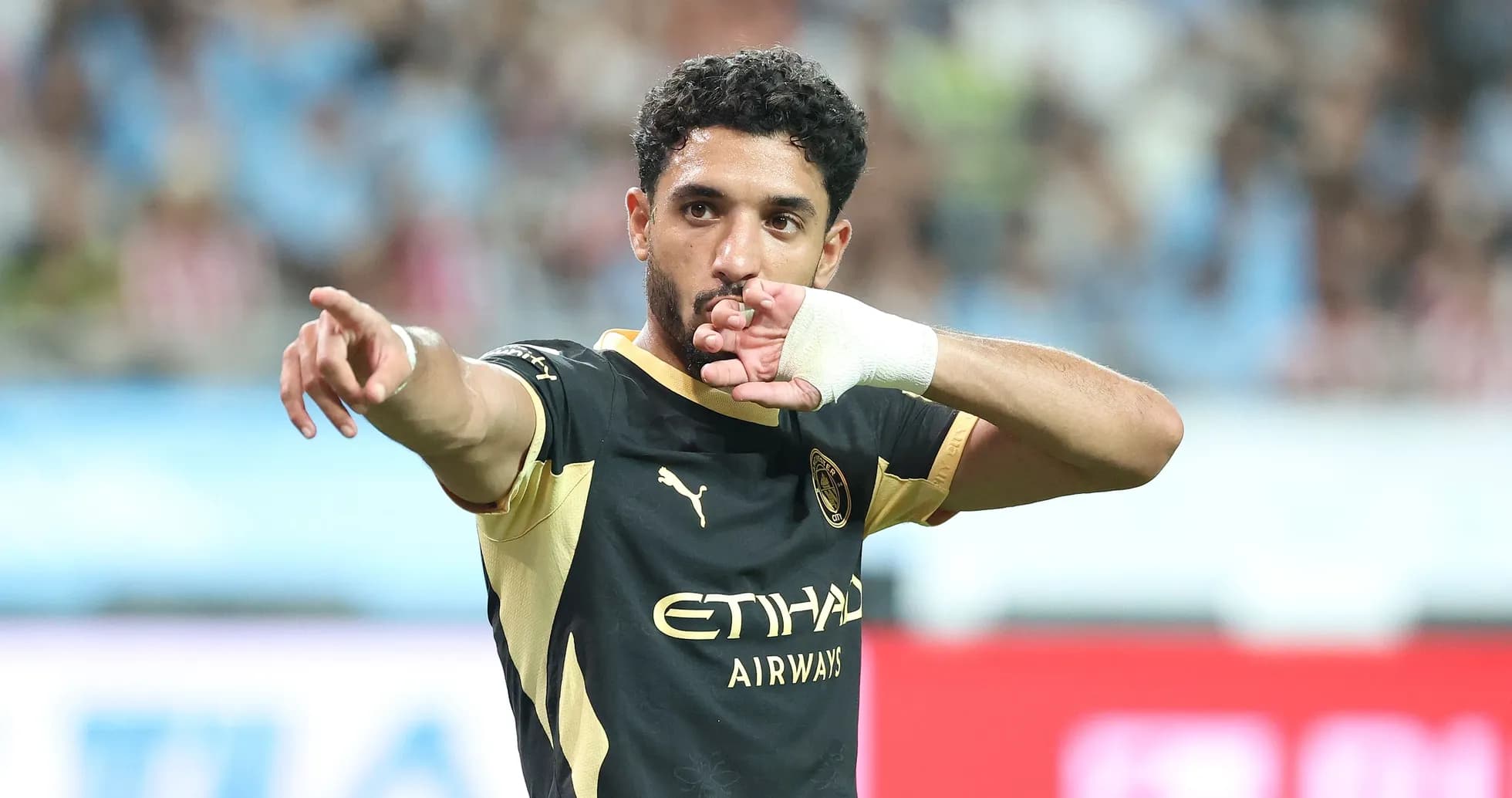 Player celebrating and pointing during match