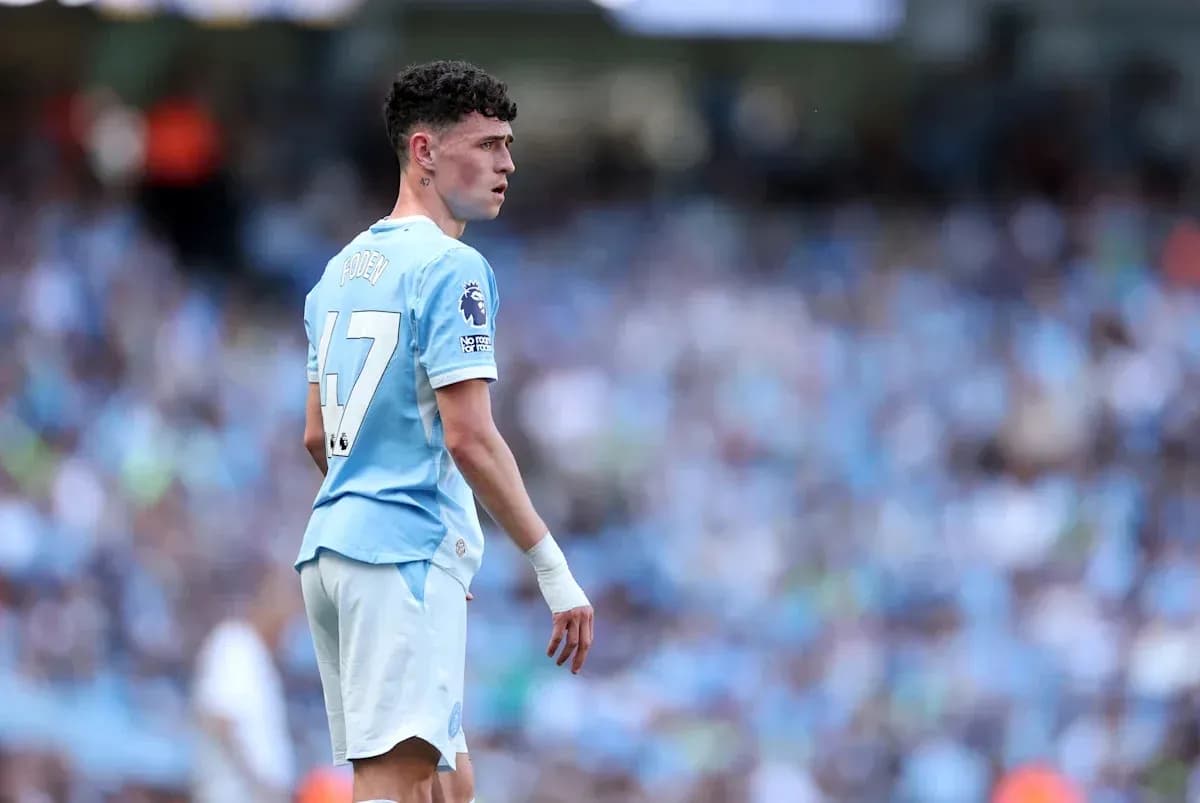 Phil Foden in Manchester City kit during match