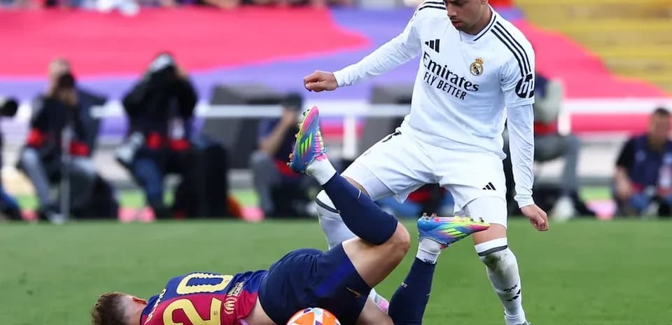 Barcelona player on the ground during match