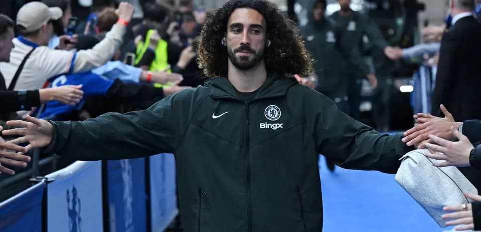 Player greeting fans while entering the stadium