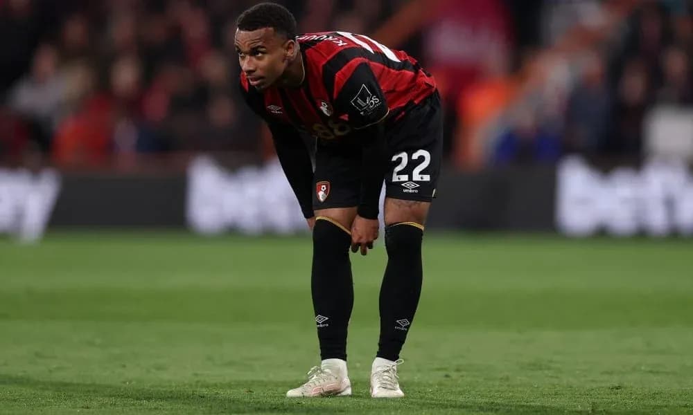Bournemouth player bending over during match