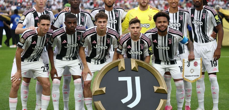 Juventus team posing with club logo before match