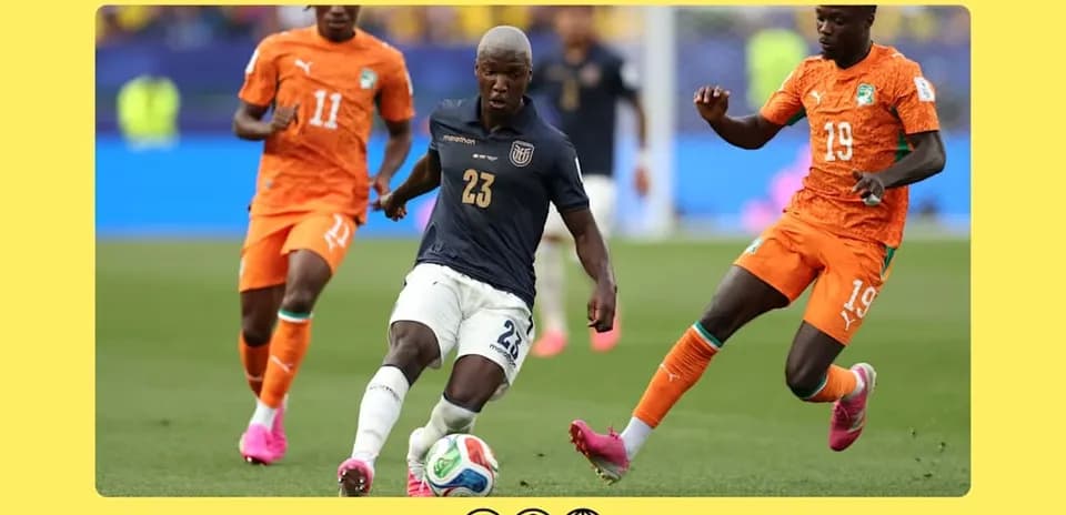 Ecuador player dribbling past Ivory Coast defenders