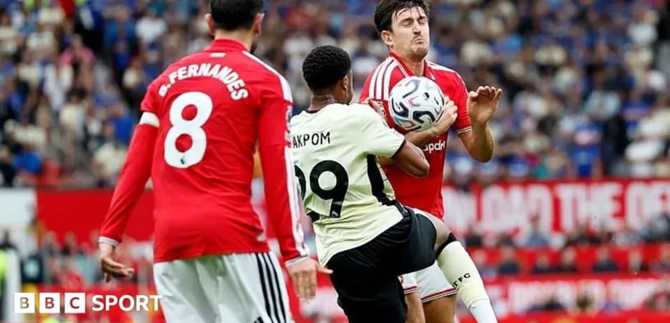 Player attempting to control ball in match action