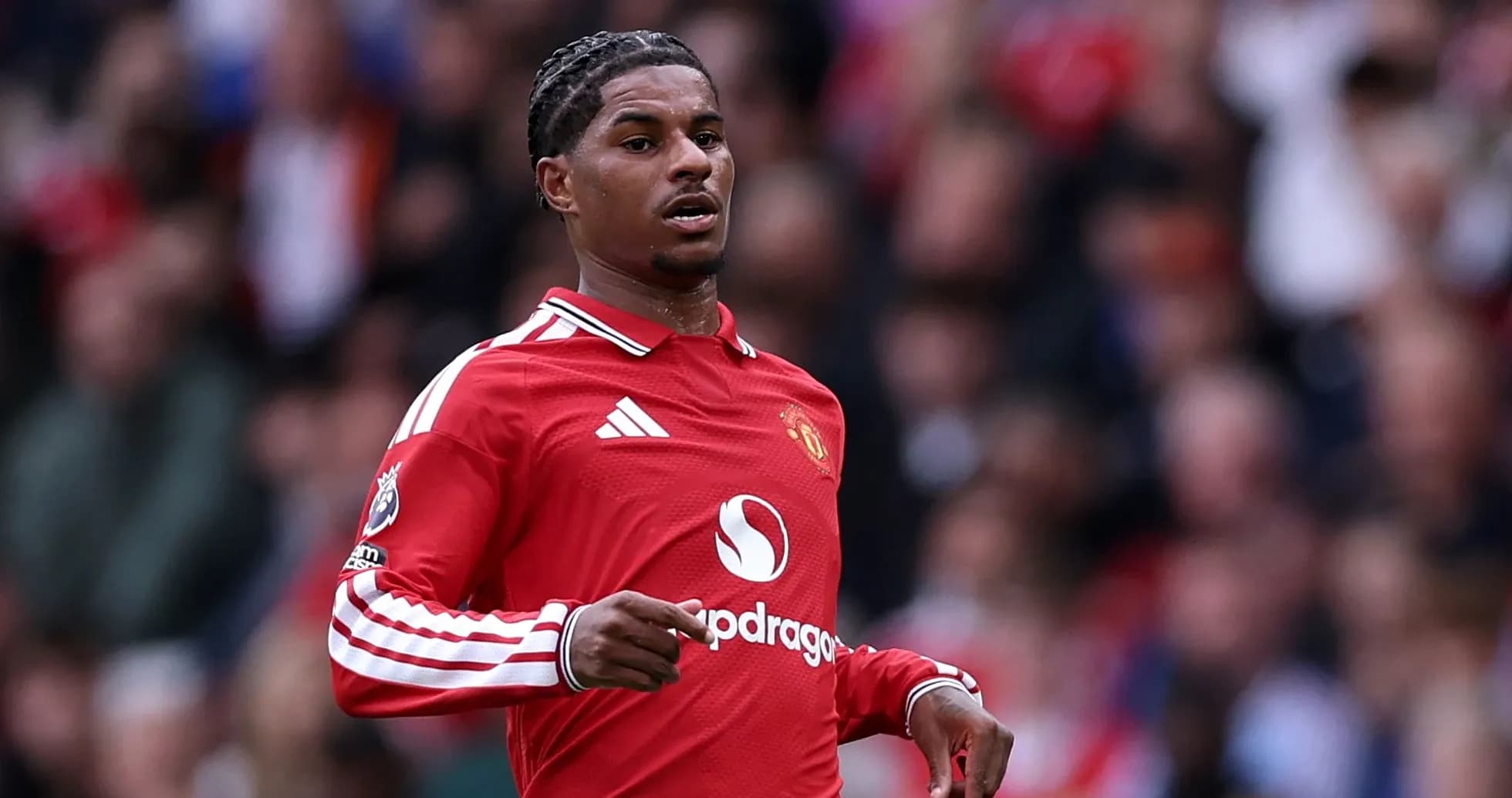 Player in red Manchester United kit during match
