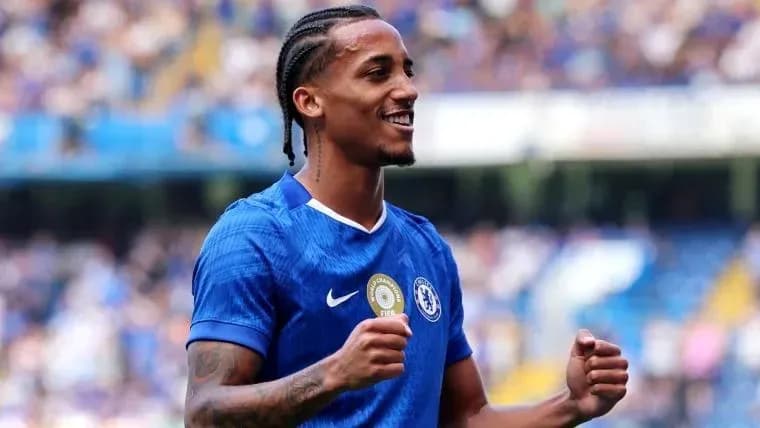 Player celebrating in Chelsea FC blue kit