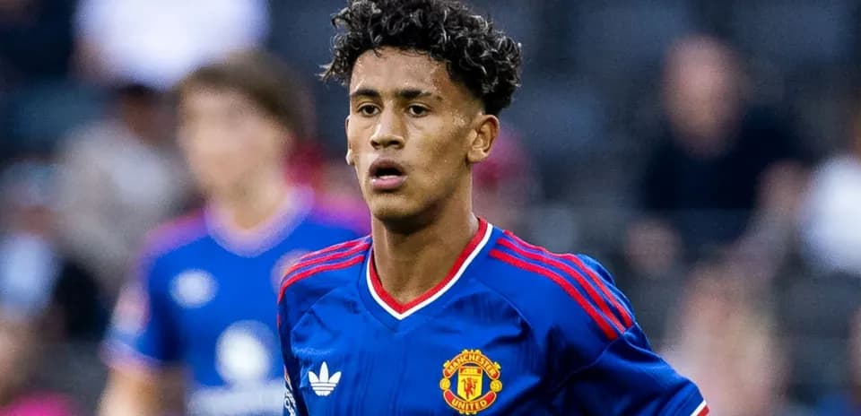 Young player in Manchester United kit on the field
