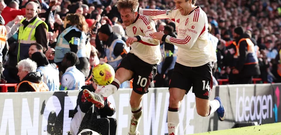 Players celebrating after scoring a goal