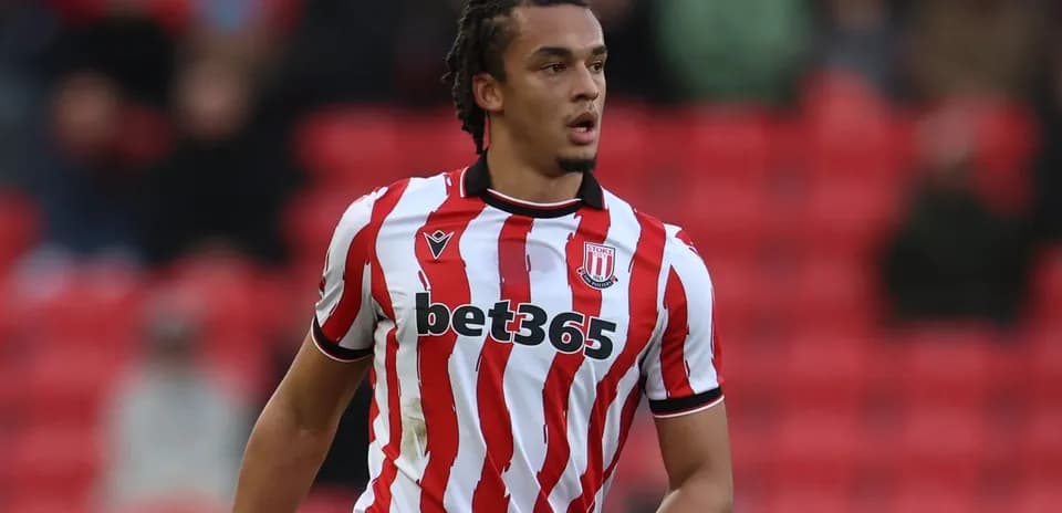 Player wearing Stoke City kit on the pitch