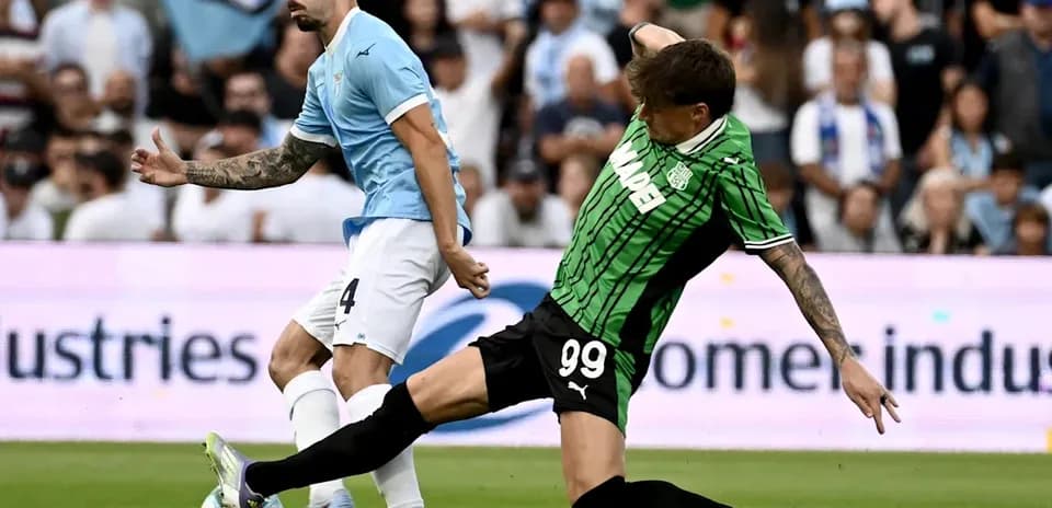 Player from Lazio evading a tackle during match