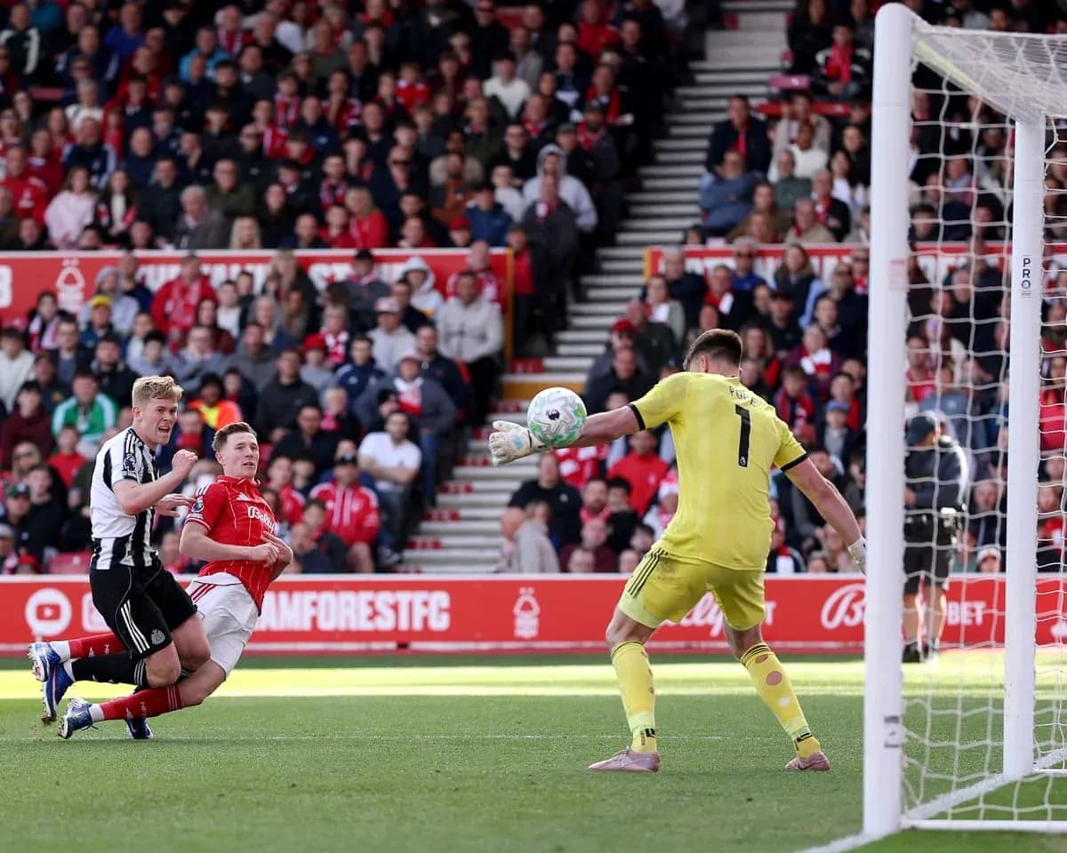 Goalkeeper making a save during Nottingham Forest match