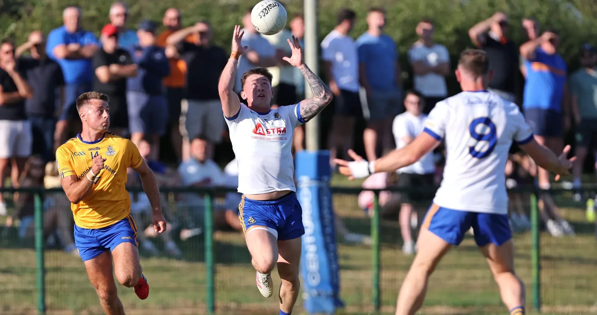 Player catching a ball during a rugby match