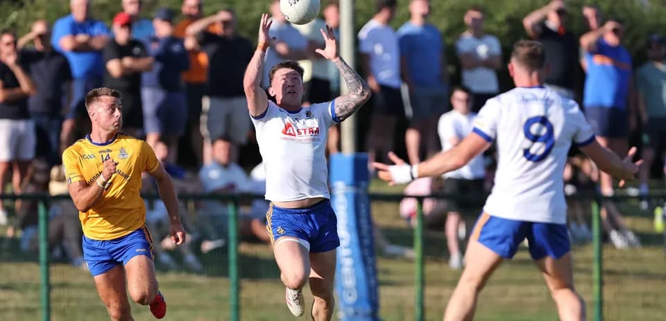 Player catching a ball during a rugby match