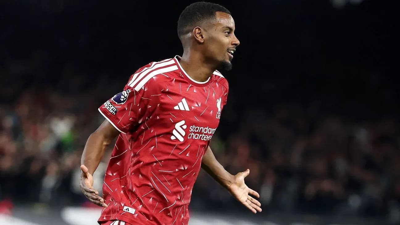 Player celebrating a goal in red jersey