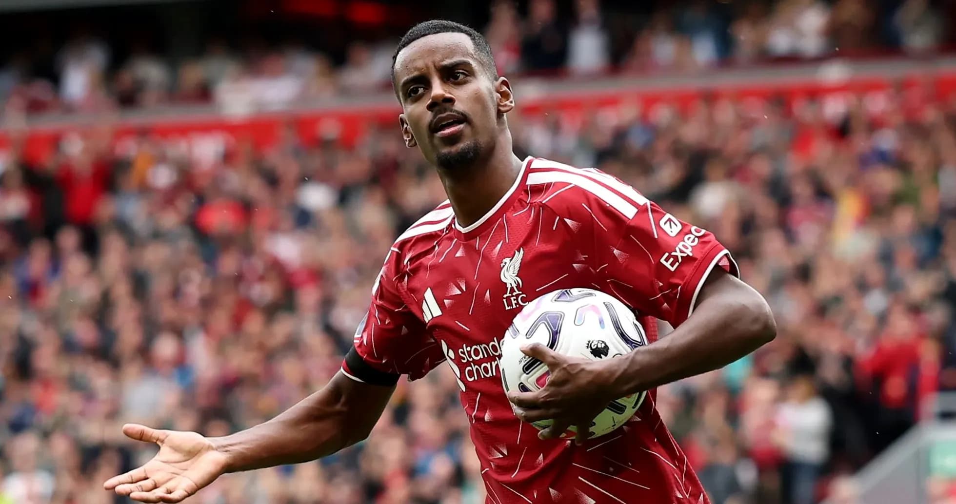 Player holding ball during match at Anfield