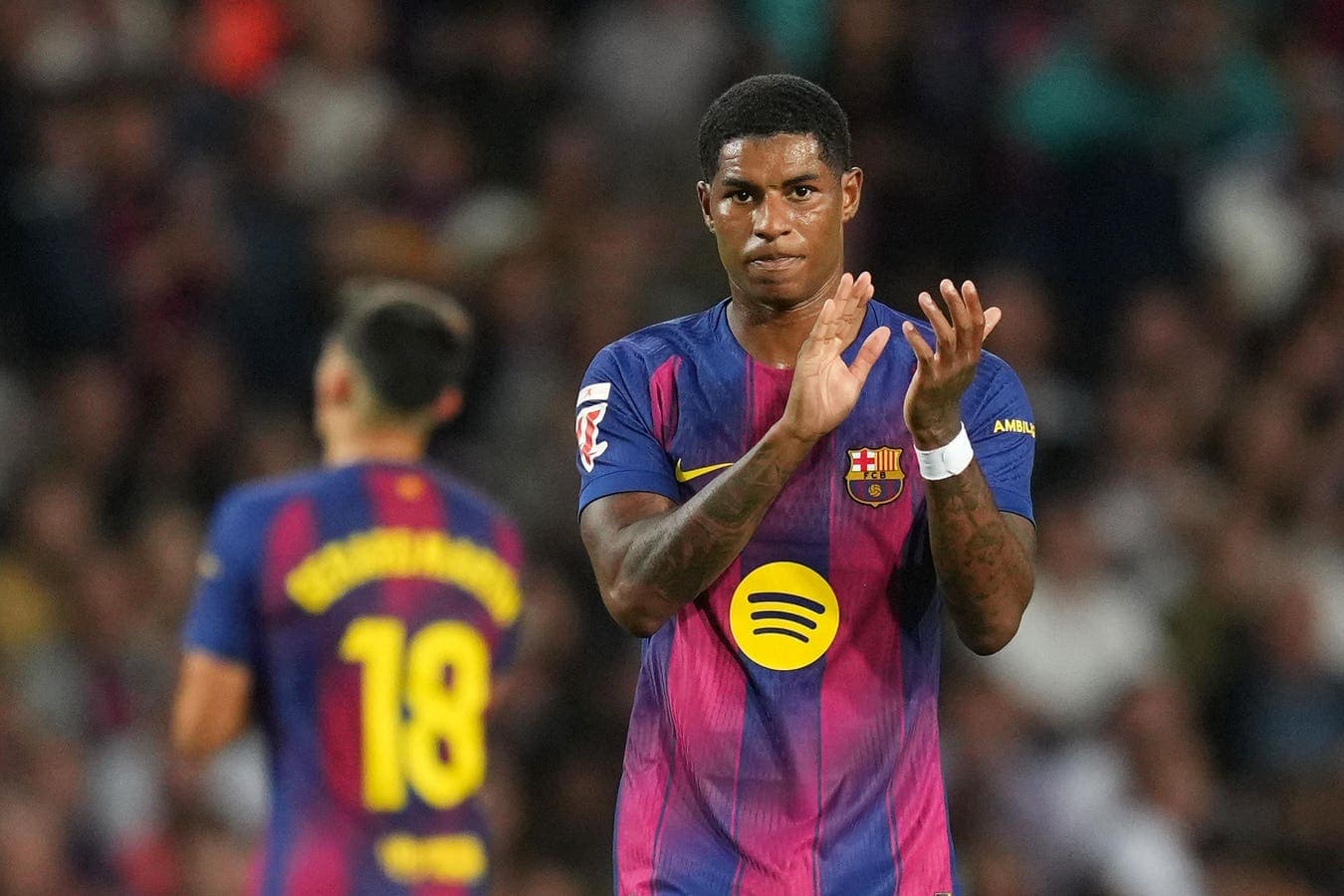 Player applauding during match at stadium