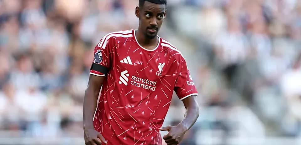 Liverpool player in red kit during match