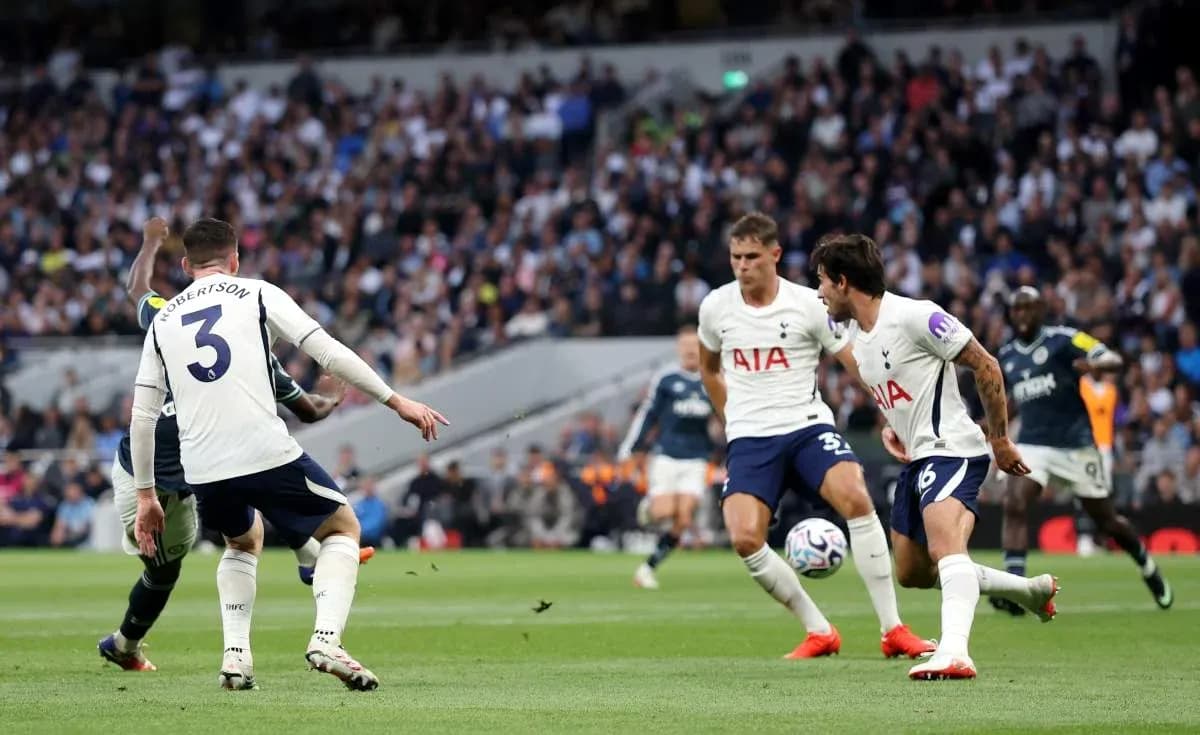 Tottenham players defending against an attacking player