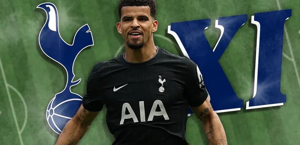 Player in Tottenham kit celebrating on pitch