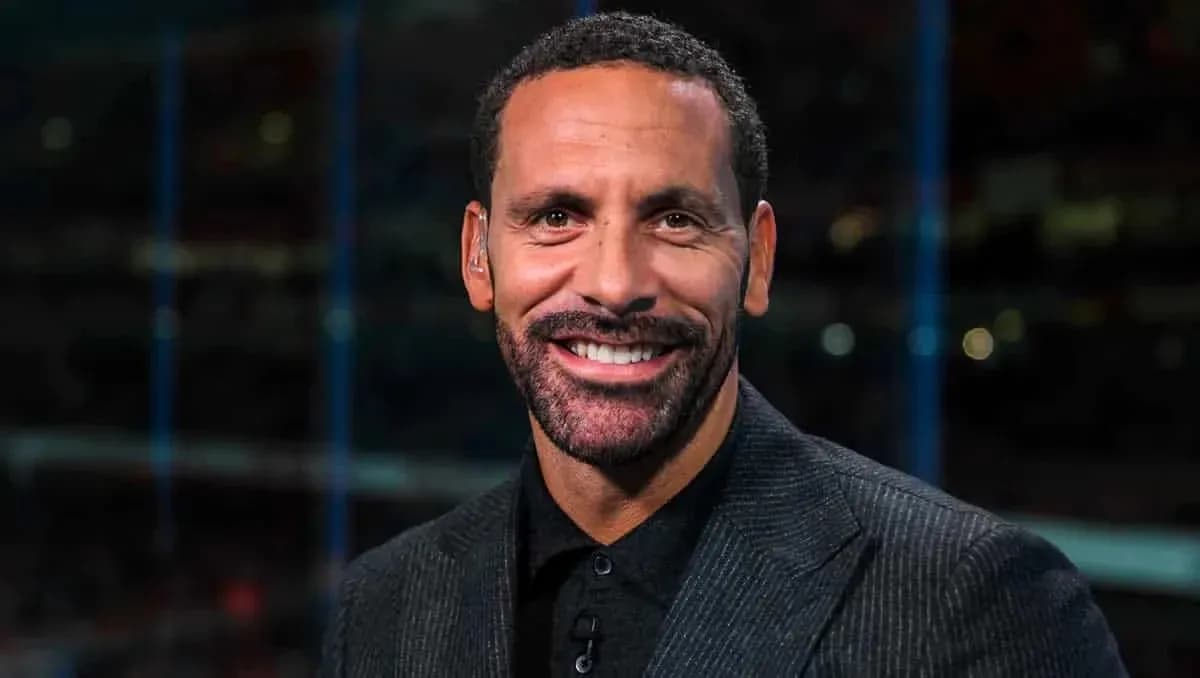 Sports analyst smiling during broadcast segment